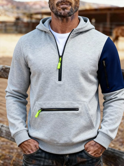 Men's Vintage Outdoor Style Patchwork Design Sweatshirt with Zipper Pockets.